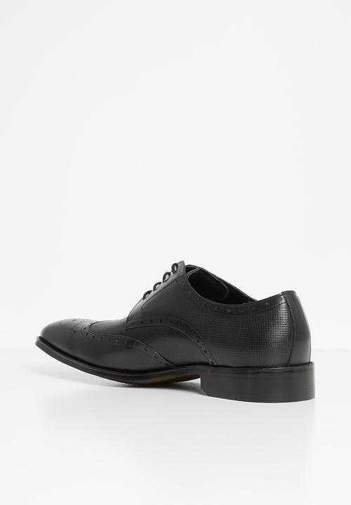 POLO - Gibson leather pin punch wing cap - black
