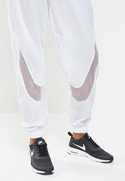 Nike - Nsw amd woven pants - white 