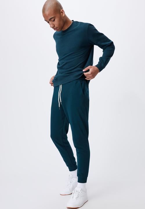 Cotton On - Trippy slim trackie - deep sea teal