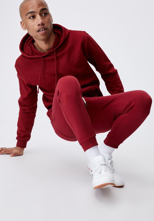 Cotton On - Trippy slim trackie - sundried red