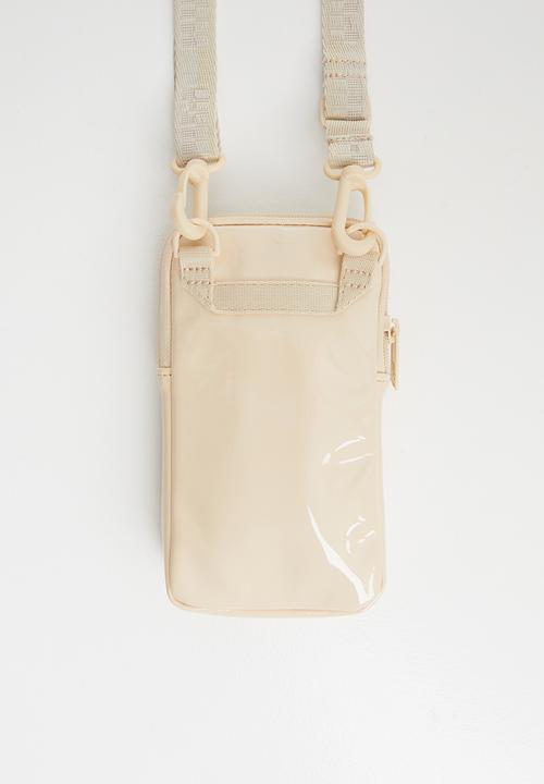 PUMA - Core up sling bag shifting - sand