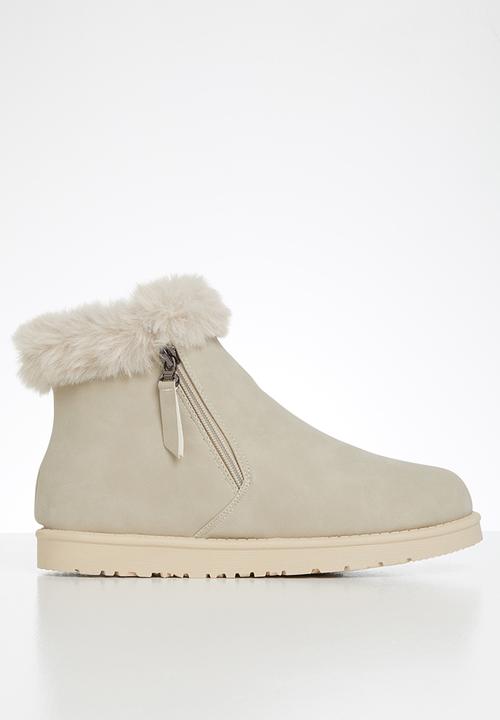 Jada - Faux fur lining zip ankle boot - beige