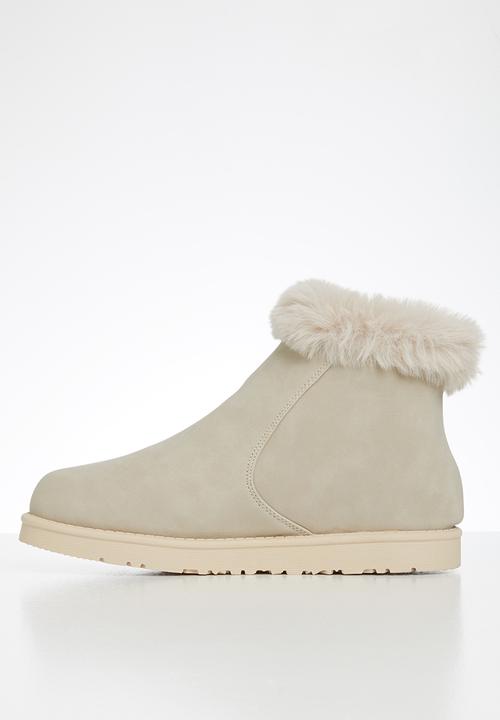 Jada - Faux fur lining zip ankle boot - beige