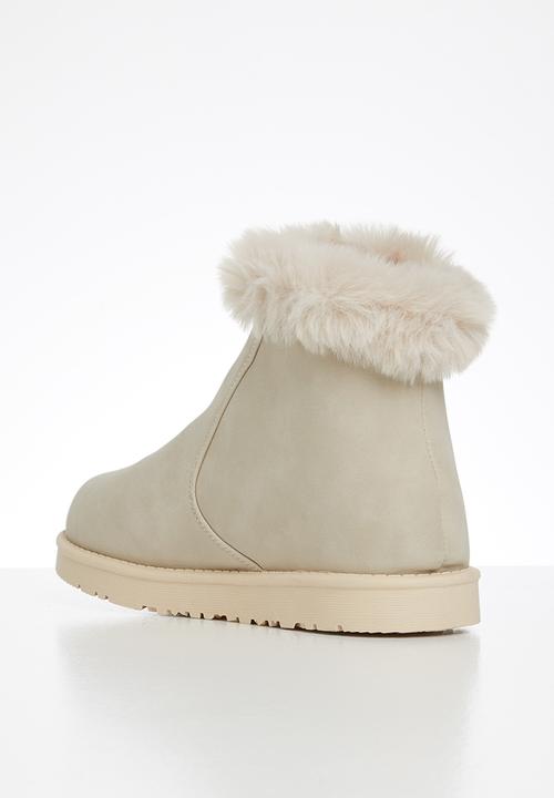 Jada - Faux fur lining zip ankle boot - beige