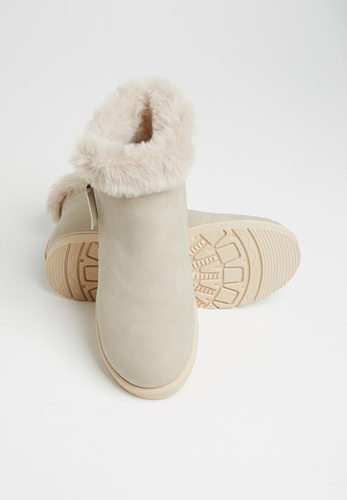 Jada - Faux fur lining zip ankle boot - beige