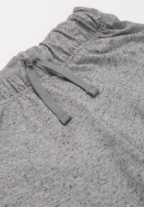 Nike - G nsw 4in short jersey - grey