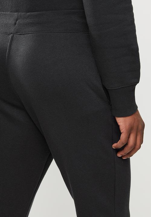 New Balance  - New Balance  classics core pant - black