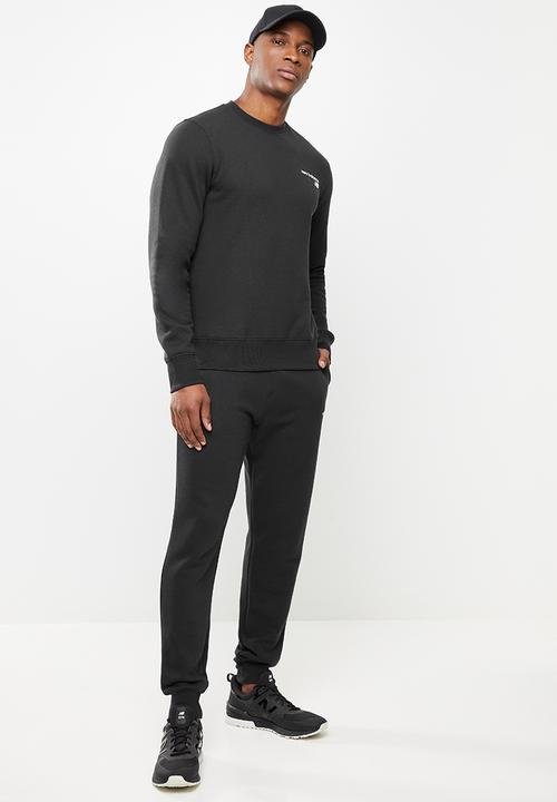 New Balance  - New Balance  classics core pant - black