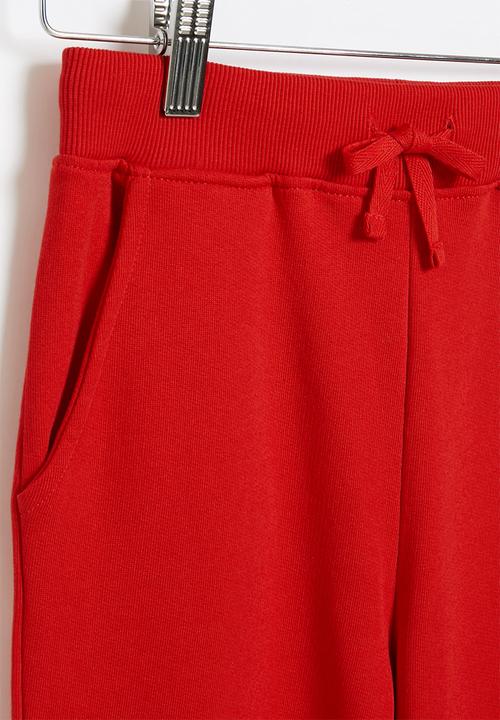 GUESS - Boys active pants - black & red hot
