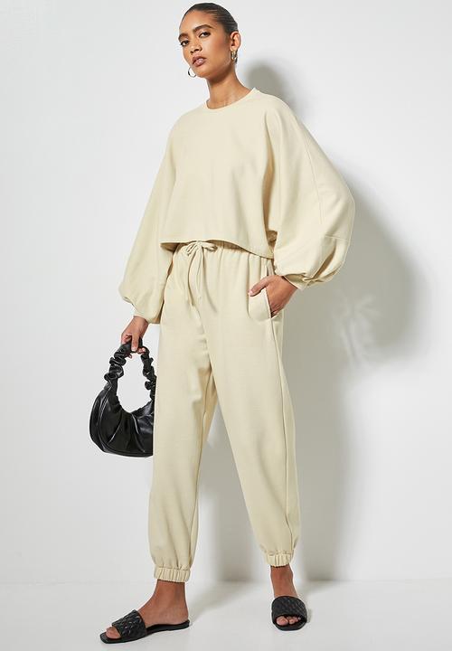 VELVET - Slouch fleece tapered leg track pant - cream