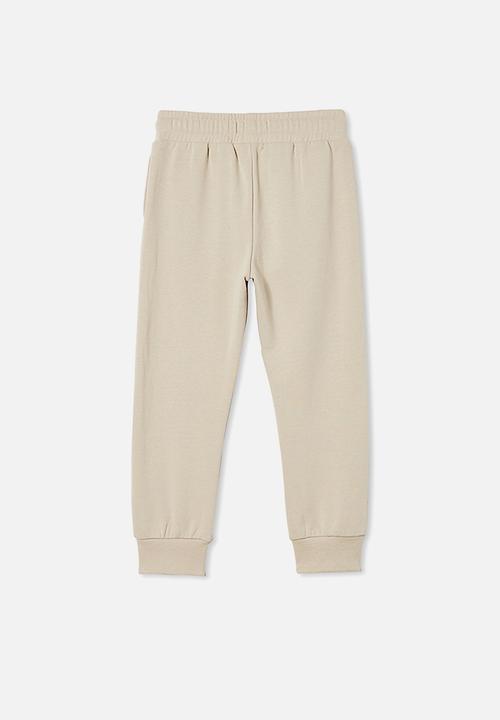 Cotton On - License slouch trackpant - beige