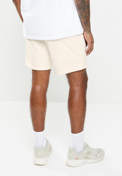 PUMA - Classics logo shorts 8” baby tr - beige