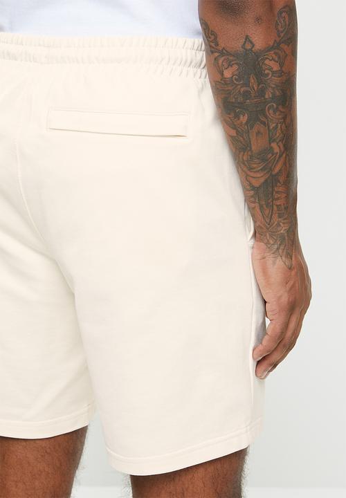 PUMA - Classics logo shorts 8” baby tr - beige