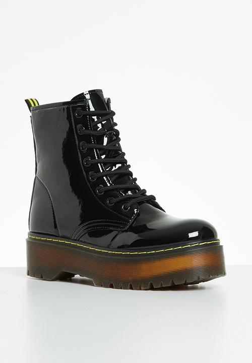 Jada - Flatform chunky lace-up boot - black