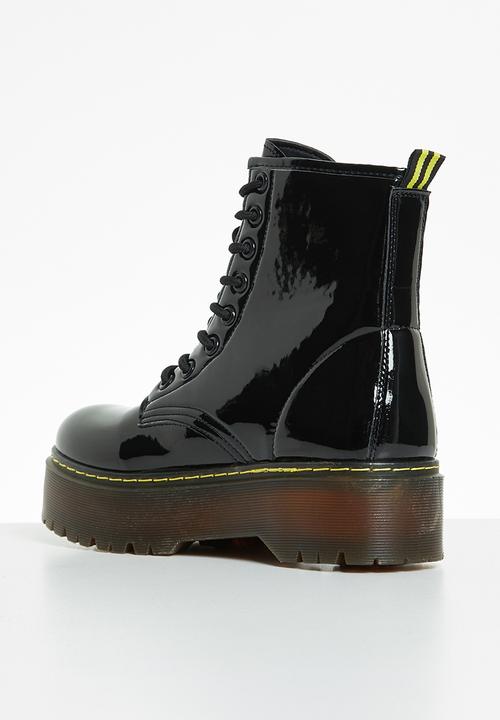 Jada - Flatform chunky lace-up boot - black