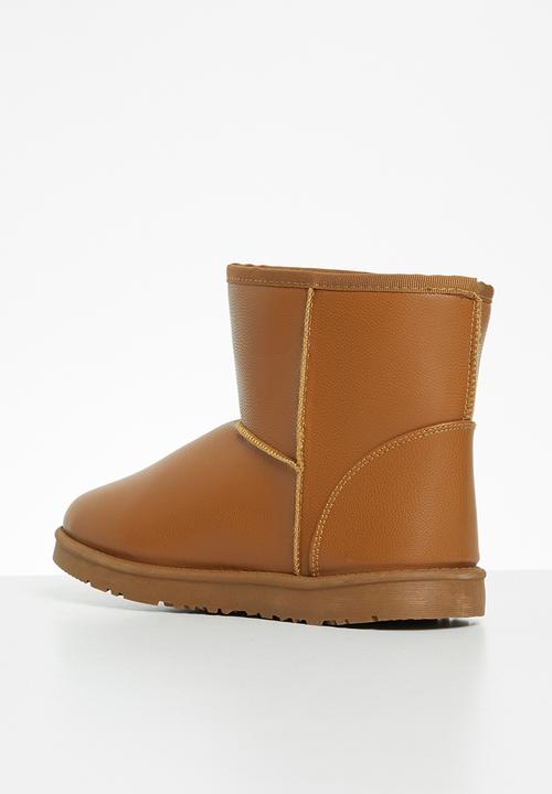 Jada - Piping detail slipper boot - tan