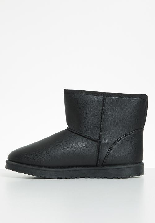 Jada - Piping detail slipper boot - black