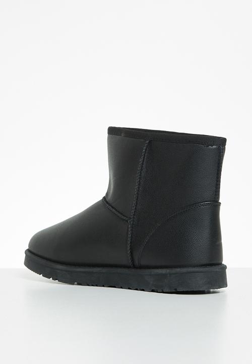 Jada - Piping detail slipper boot - black