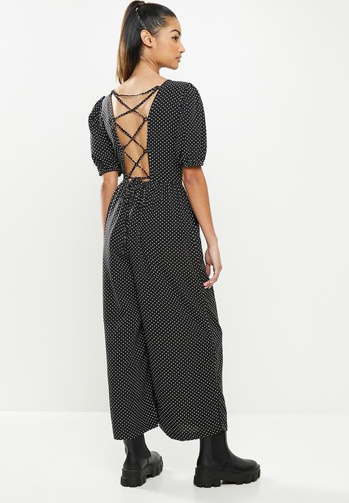 Missguided - Petite tie back puff sleeve jumpsuit - black & white 