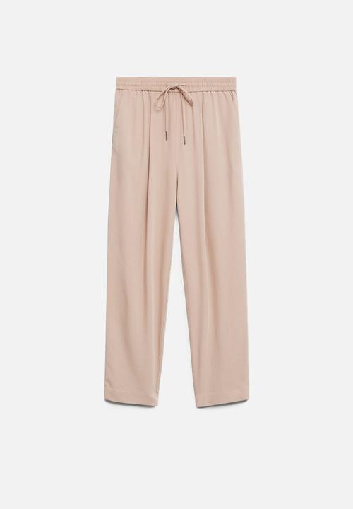 MANGO - Trousers fluido - light pastel pink