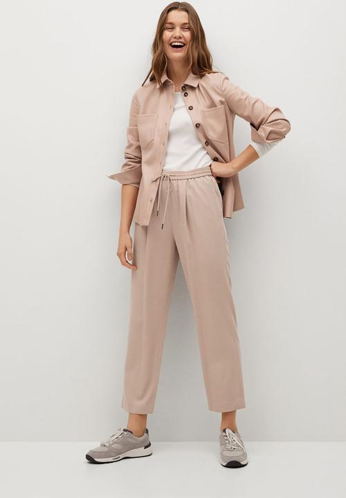 MANGO - Trousers fluido - light pastel pink