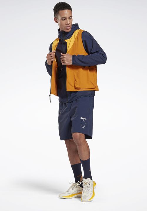 Reebok - Ts road trip vest jackets - radiant ochre