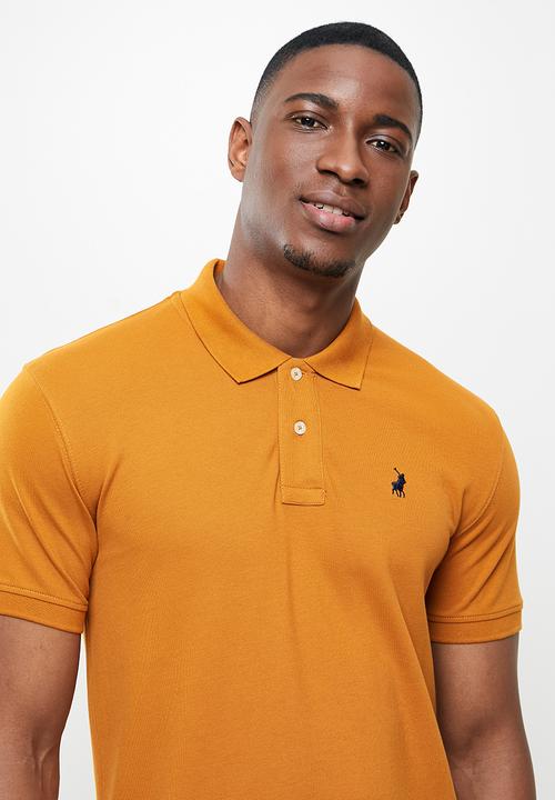 POLO - Carter custom fit  golfer - pumpkin