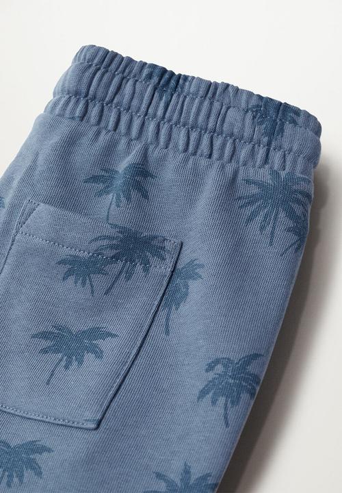 MANGO - Bermuda shorts palms - blue