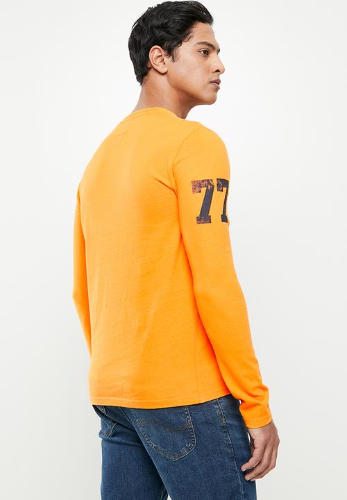 Superdry. - Collegiate graphic long sleeve top - alaska gold