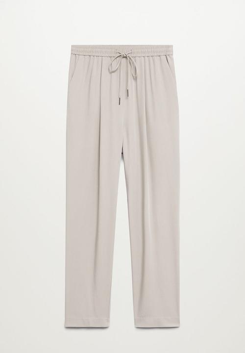 MANGO - Trousers fluido - natural
