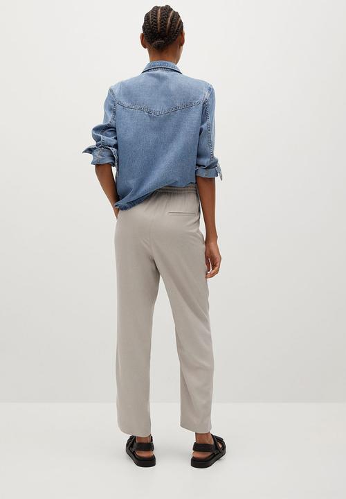 MANGO - Trousers fluido - natural