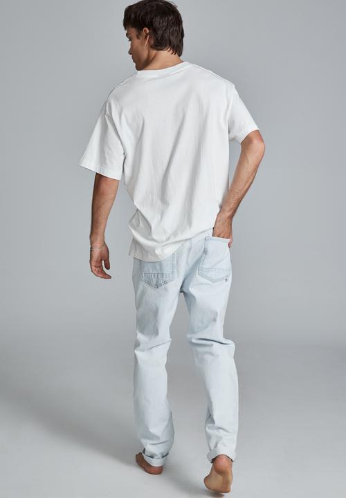Cotton On - Relaxed tapered jean - light blue