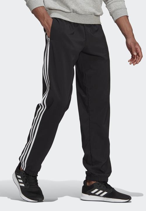 adidas Performance - Essentials 3-Stripes Woven trackpants - black/white