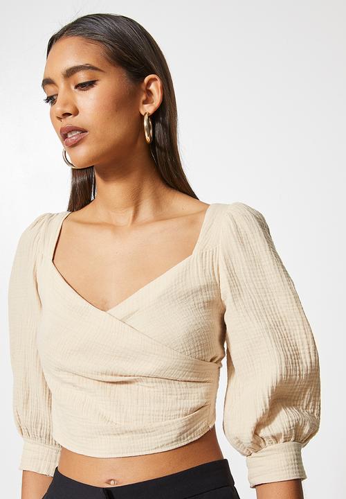 VELVET - Textured cross over front puff sleeve crop with tie back - stone