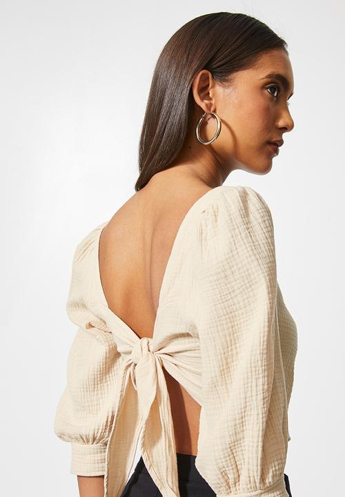 VELVET - Textured cross over front puff sleeve crop with tie back - stone
