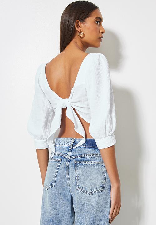 VELVET - Textured cross over front puff sleeve crop with tie back - white