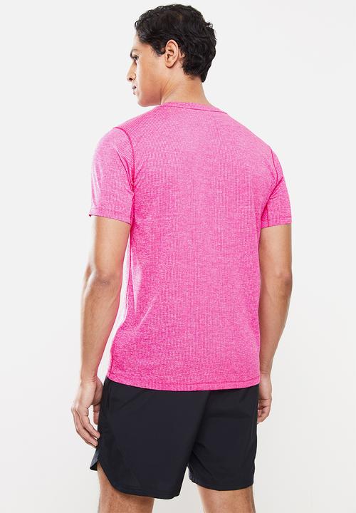 New Balance  - Tenacity short sleeve - pink glo