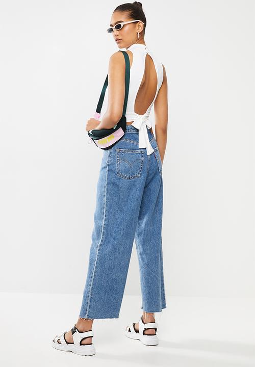 Blake - Turtle neck sleeveless tie back detail crop top - white