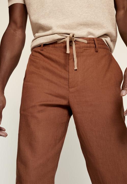 MANGO - Trousers flak - rust