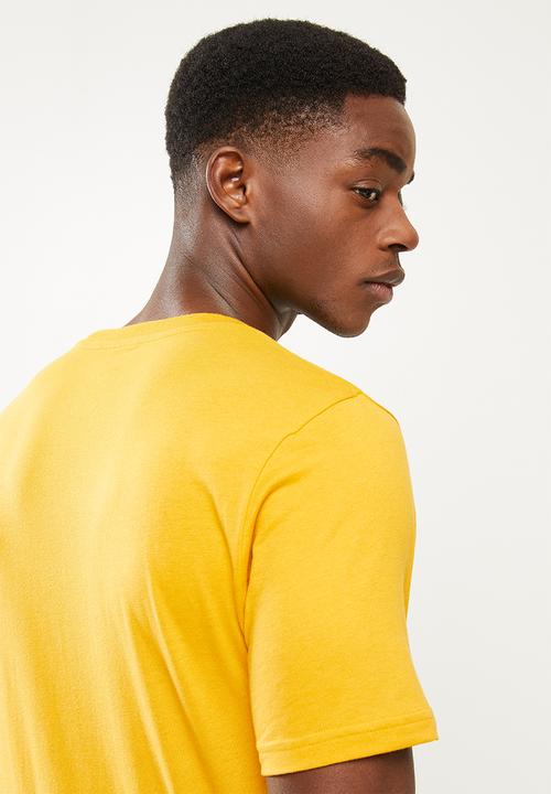 New Balance  - Nb classics core tee - varsity gold