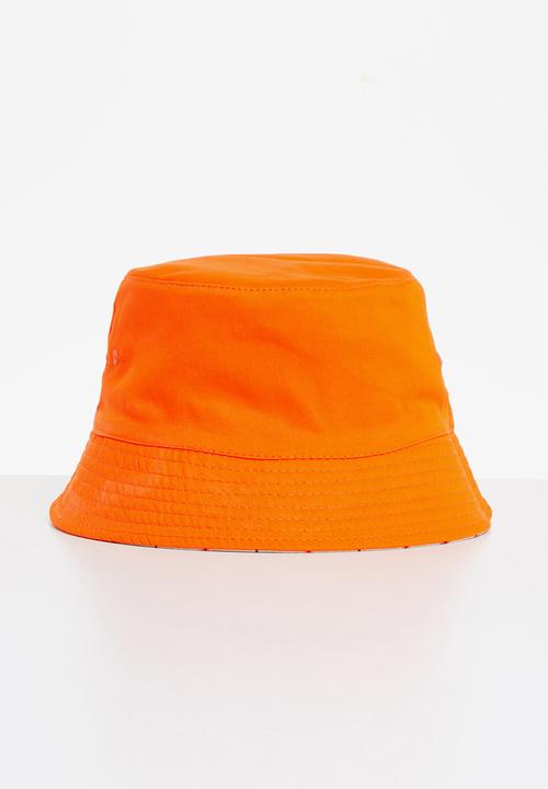 Superbalist - Reversible bucket hat - orange & beige