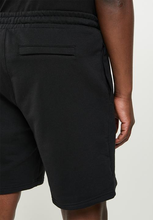 PUMA - Classics logo shorts tr - black