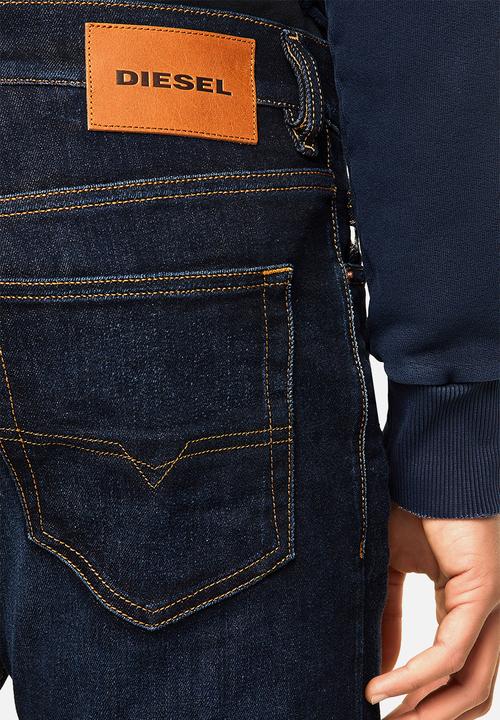 Diesel  - D-luster slim fit 5 pocket jeans - dark wash blue