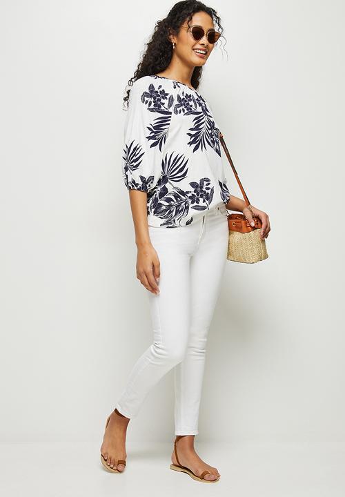 edit - Soft raglan sleeve shell - mono tropical