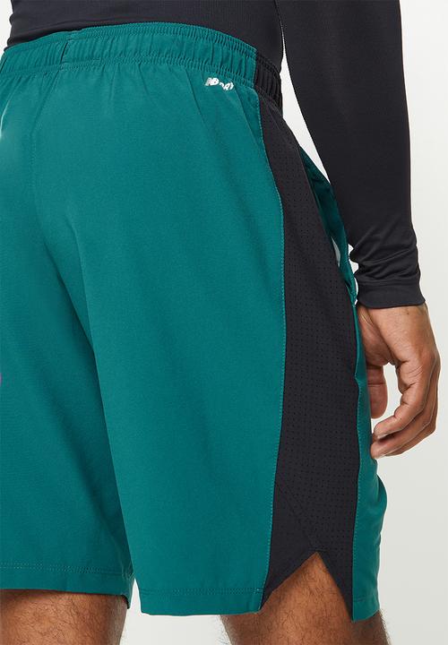 New Balance  - Tenacity 9in short print - mountain teal