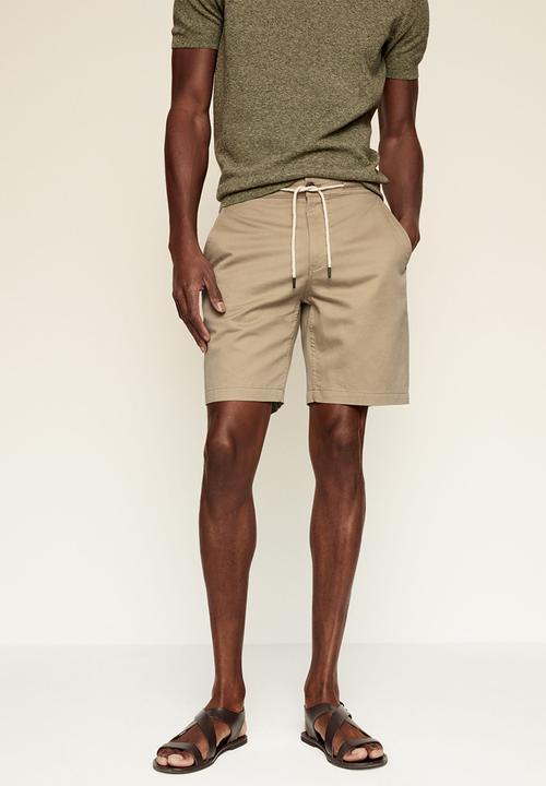 MANGO - Bermuda shorts flek - light beige