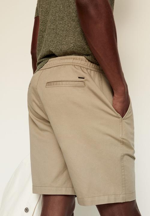 MANGO - Bermuda shorts flek - light beige