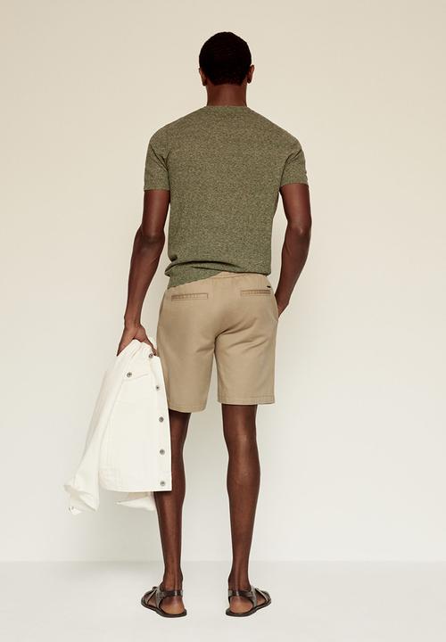 MANGO - Bermuda shorts flek - light beige