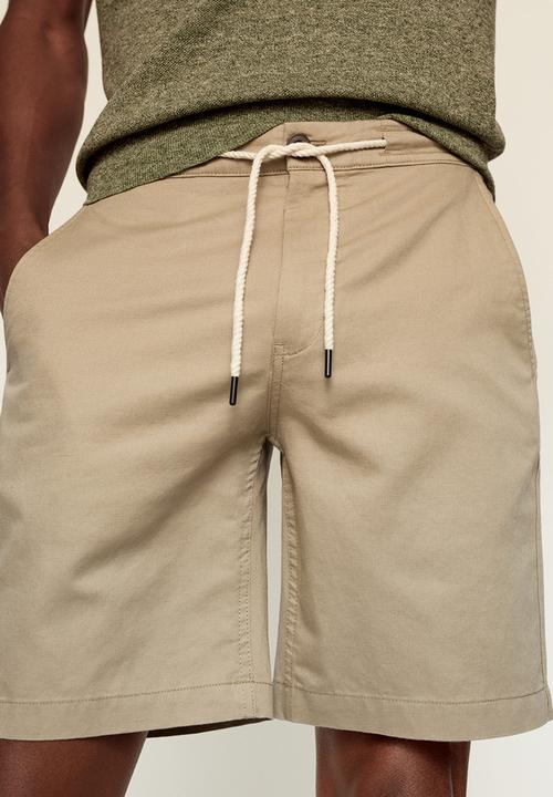 MANGO - Bermuda shorts flek - light beige