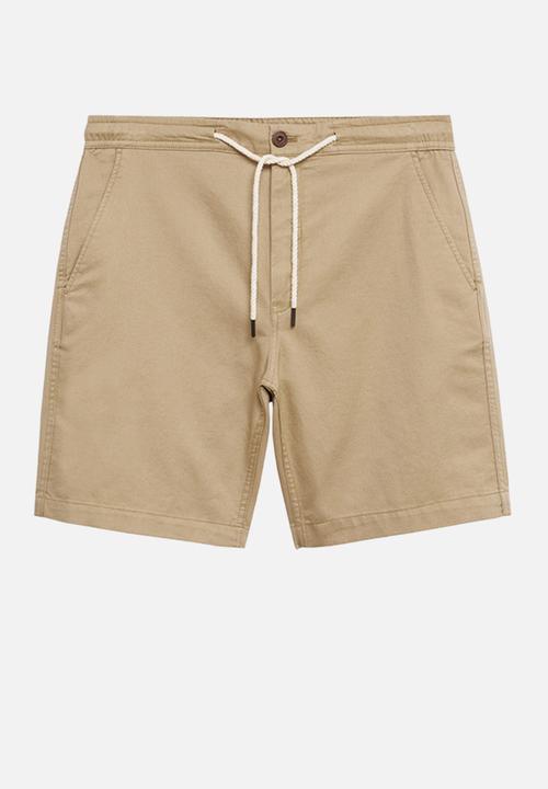 MANGO - Bermuda shorts flek - light beige